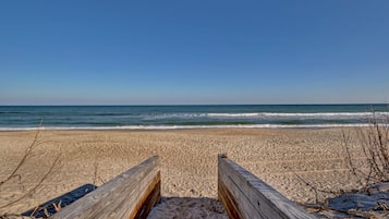 On the beach, sun loungers, beach towels