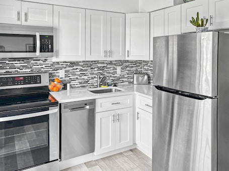 Fridge, microwave, oven, stovetop. 2 Bedroom Lovely, Bright & Comfy Walk to Beach - Private, Yard, Parking