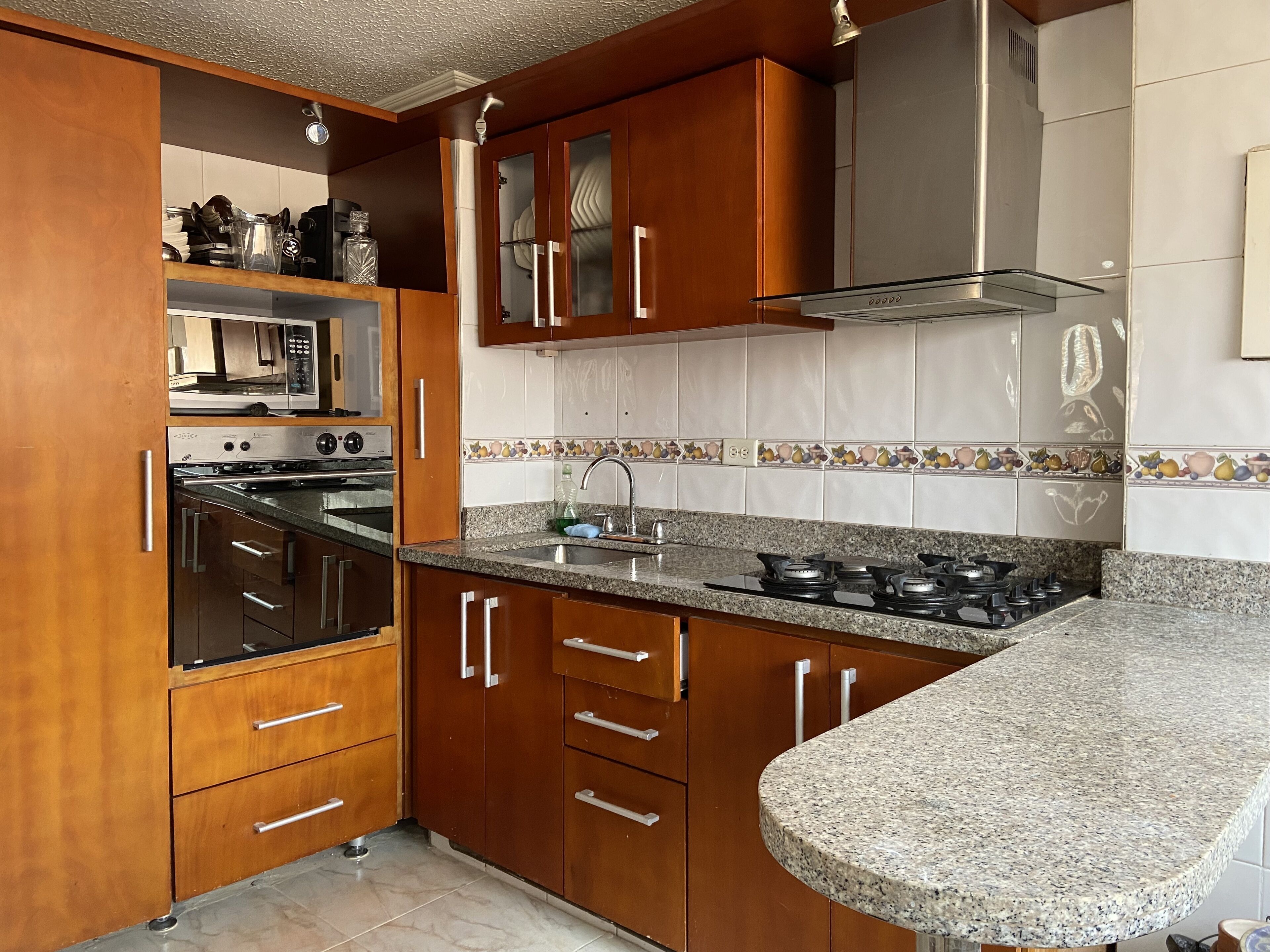 Microwave, oven, coffee grinder, cookware/dishes/utensils