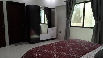 2 bedrooms, desk, iron/ironing board, travel crib