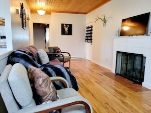 Cozy living area with plenty of blankets and pillows 