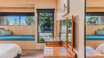 4 bedrooms, desk, iron/ironing board, travel cot