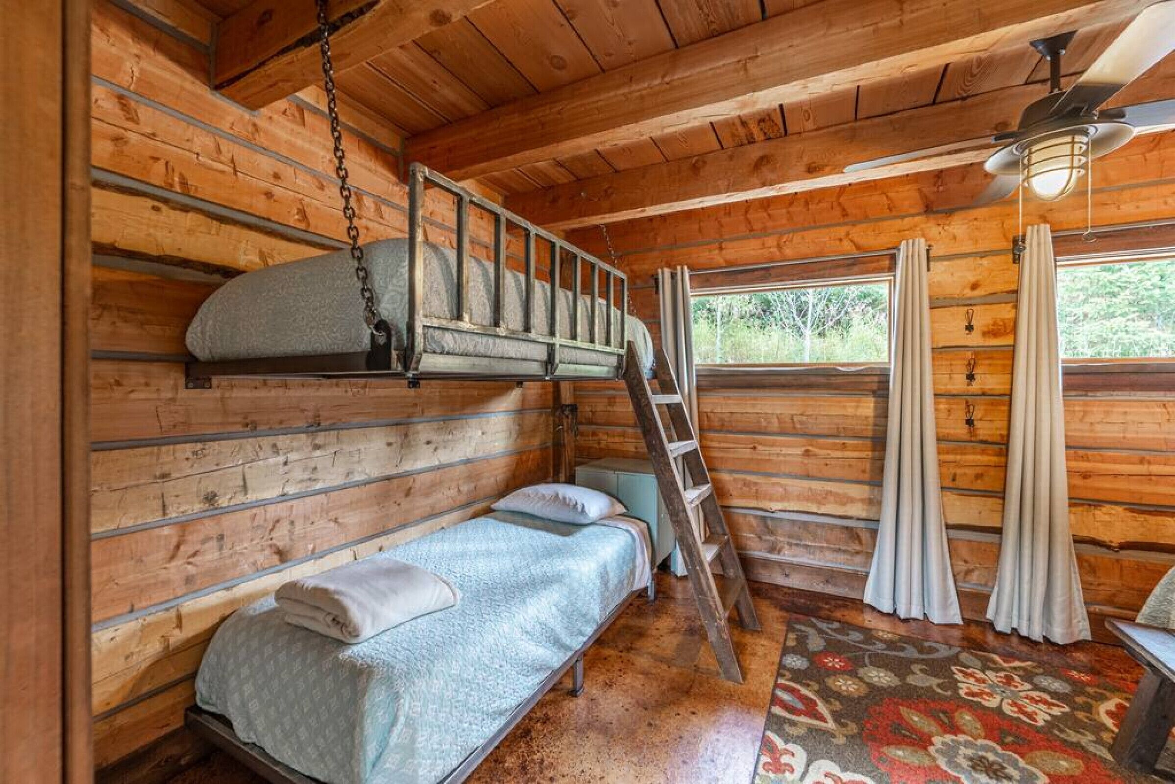 Cozy cabin outside Glacier National Park. Private hot tub + pet-friendly!