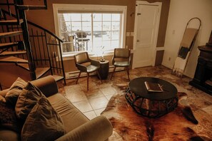 TV, books - Bears Paw Duplex Cabin (#12) at The Woolly Bugger Inn (Estes Park)
