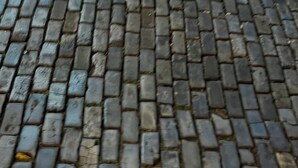Eine Nahaufnahme eines Kopfsteinpflasterbelags.