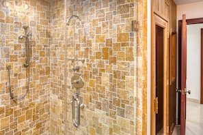 Bathtub, hair dryer, towels, soap