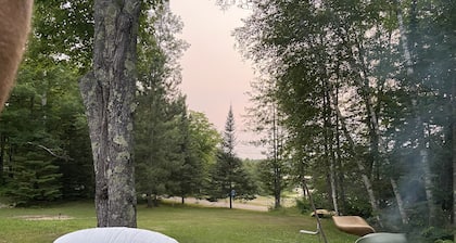 Cabin within a short walk to the beach and boat landing.