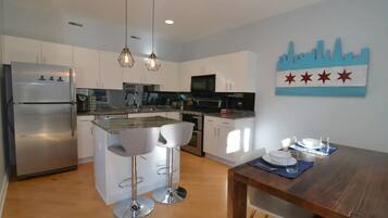 Coffee/tea maker, fridge, microwave, oven