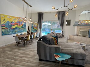 Smart TV, fireplace, books, music library