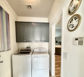 Convenient laundry facilities with washer and dryer.