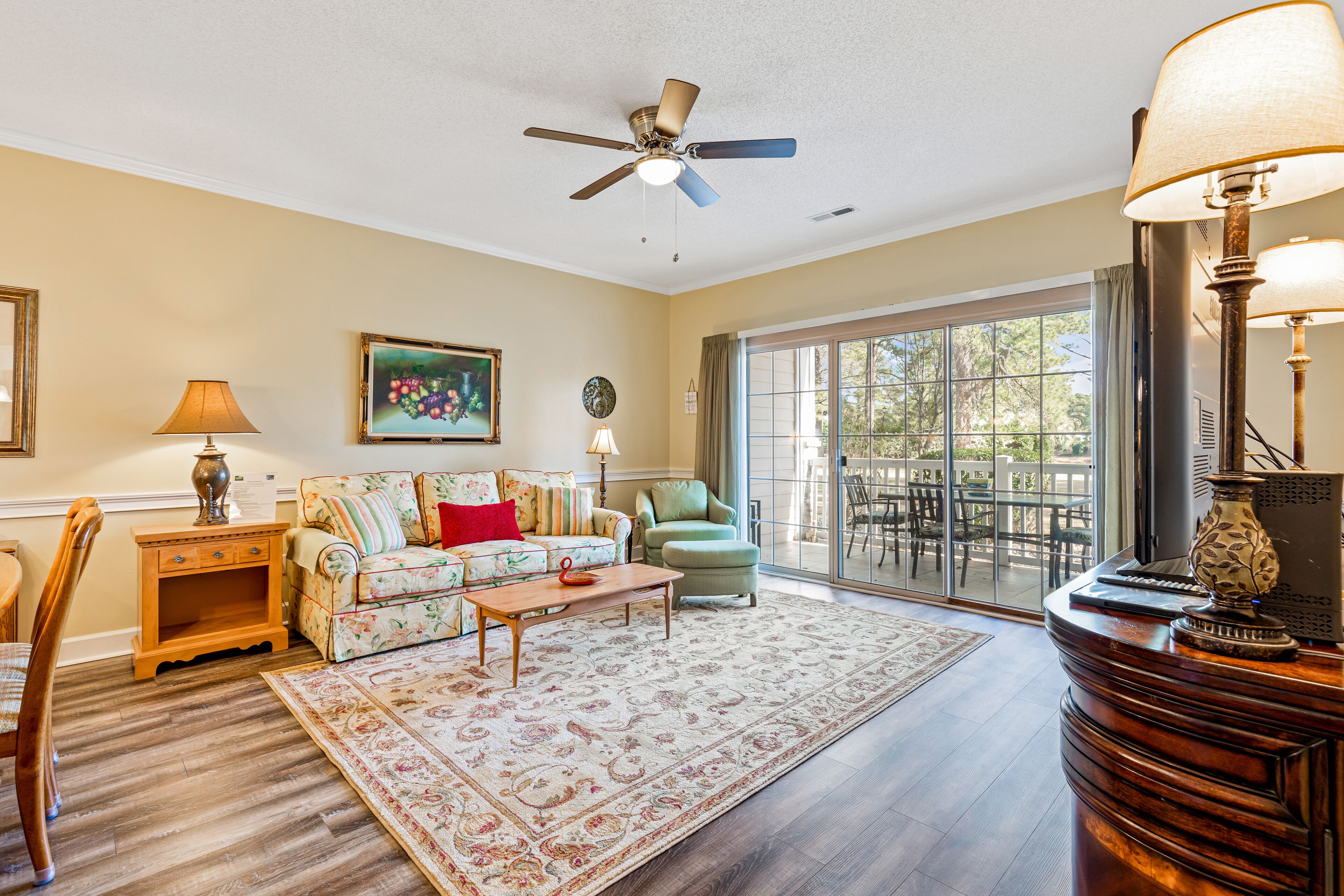 Homey condo with WiFi, central AC, w/d, and shared pool - two miles to beach