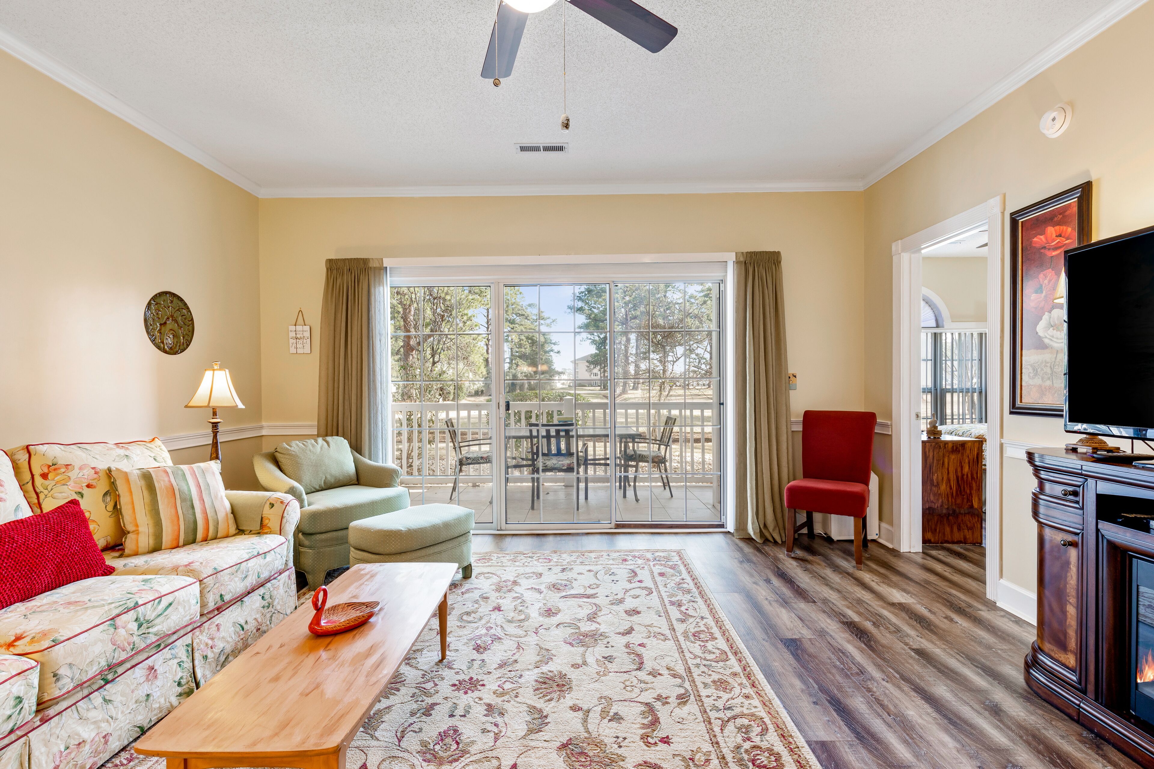 Homey condo with WiFi, central AC, w/d, and shared pool - two miles to beach