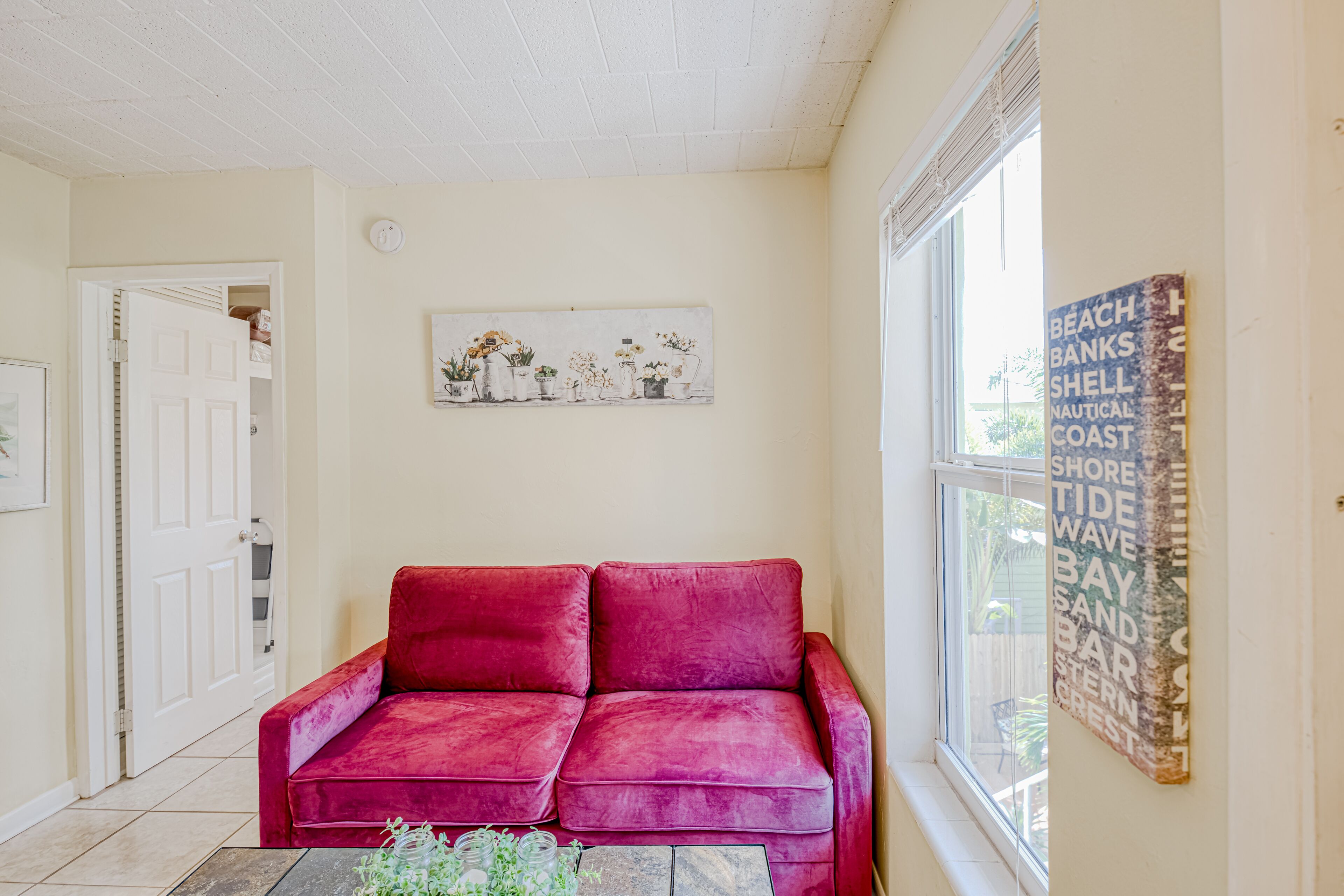 Adorable second-floor home with WiFi, shady patios, shared W/D, & kitchenette