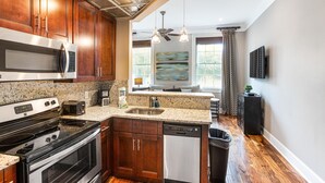Apartment, 1 Bedroom | Private kitchen - Suites at Bay by Lucky Savannah (Savannah)