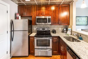 Apartamento, 1 quarto | Cozinha privada | Cooktop