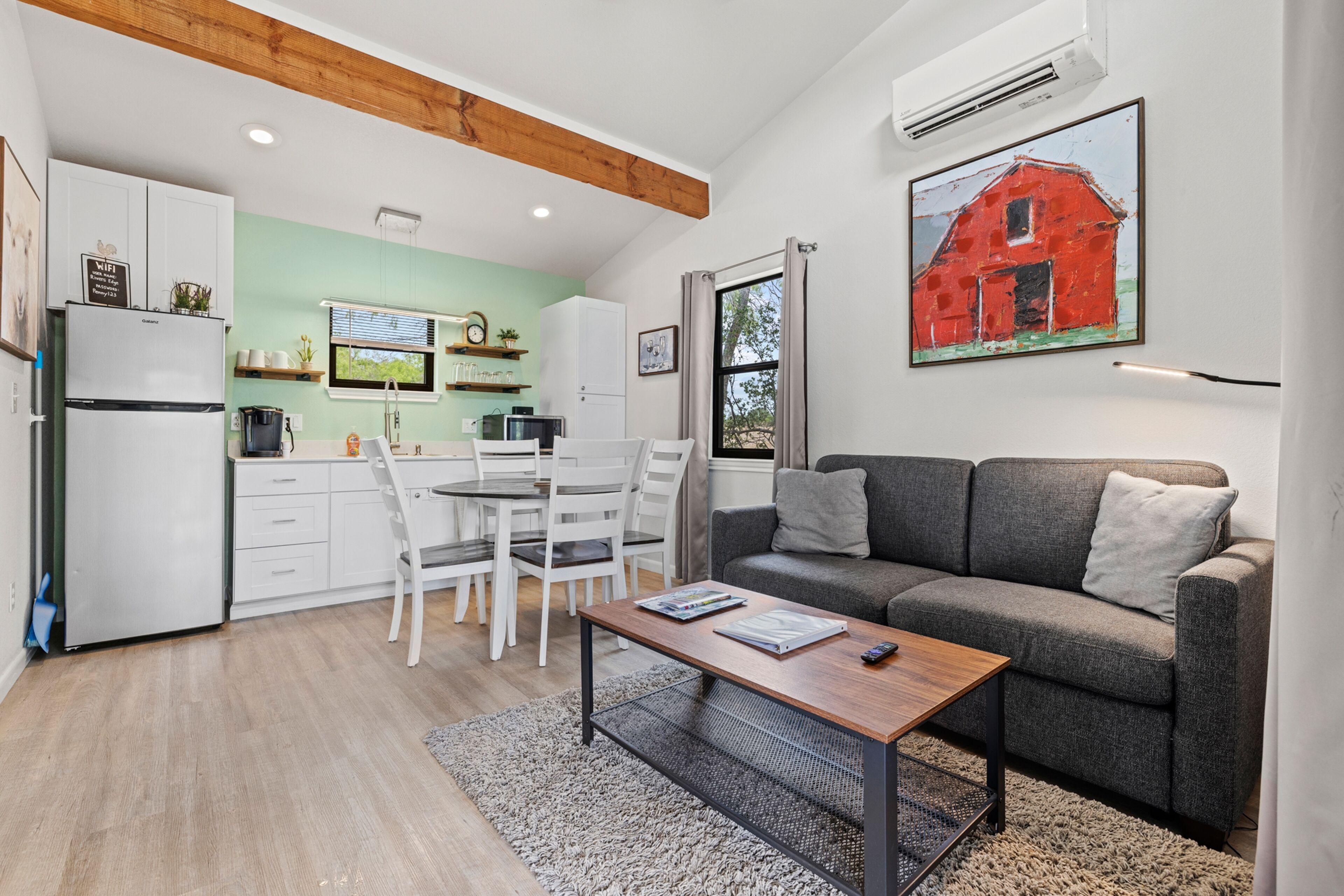 River's Edge Cottage with private hot tub, waterfront locale & river views