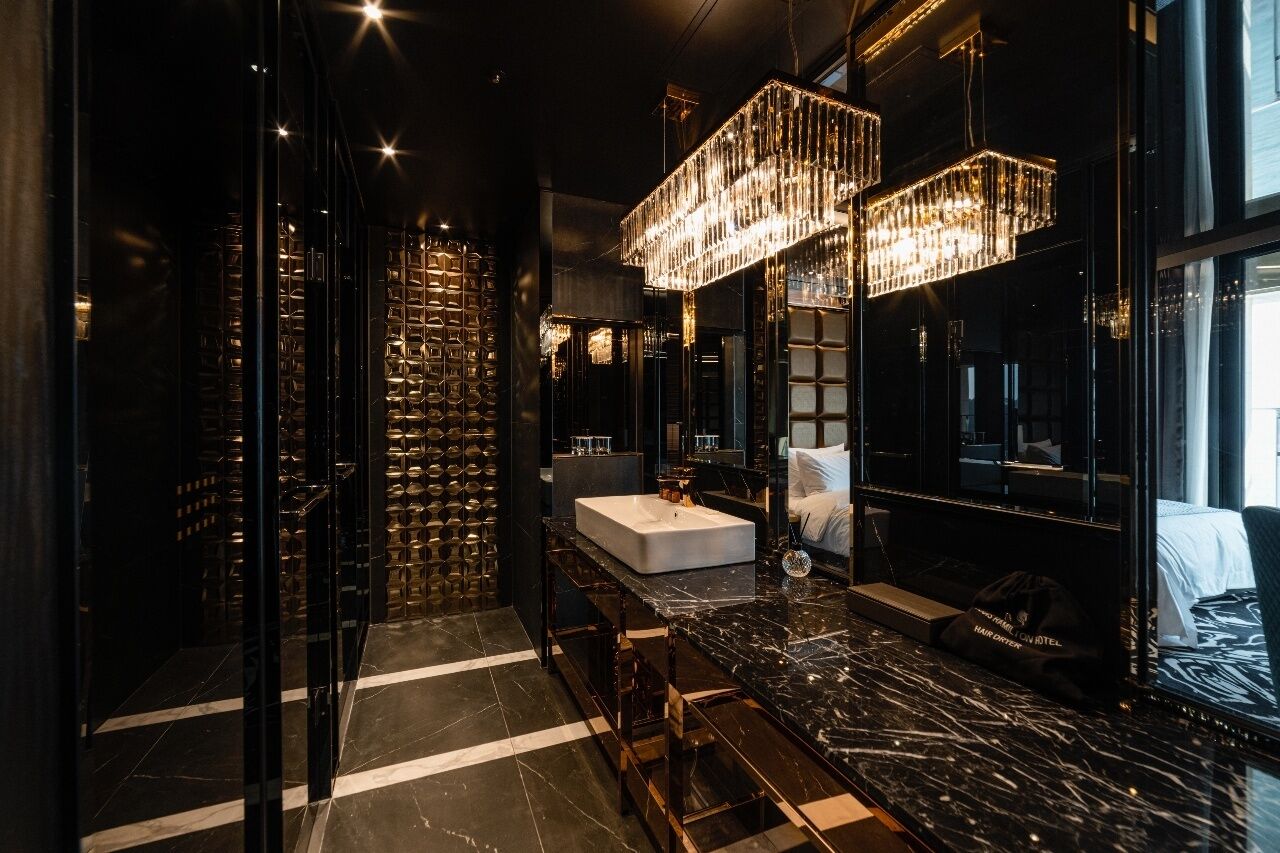 hair dryer, bathrobes, slippers, towels