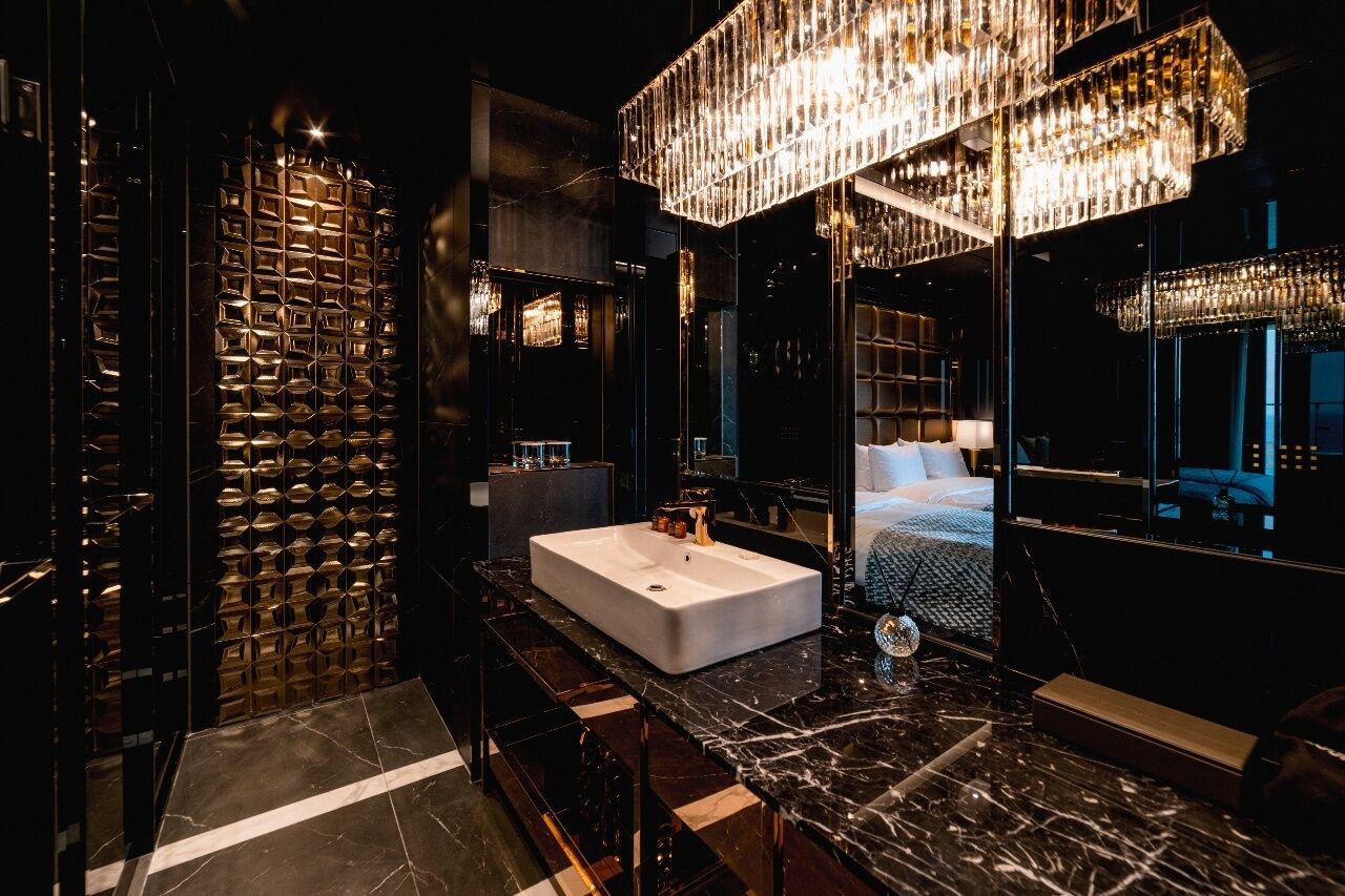 hair dryer, bathrobes, slippers, towels