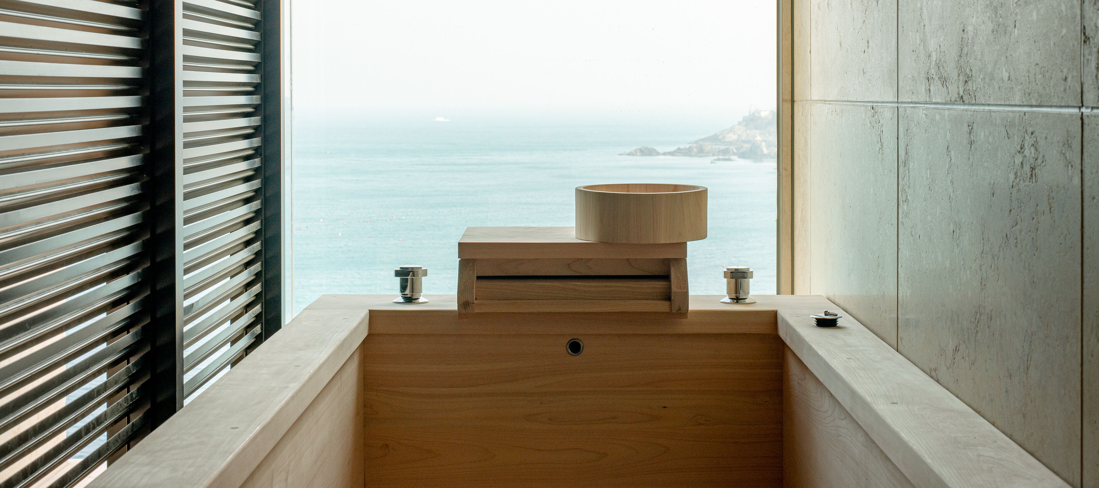 hair dryer, bathrobes, slippers, towels