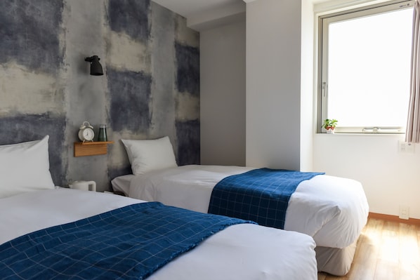Standard Twin Room | Blackout drapes, iron/ironing board, free WiFi, bed sheets
