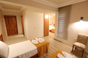 Family Suite, 2 Bedrooms | Premium bedding, minibar, desk, laptop workspace