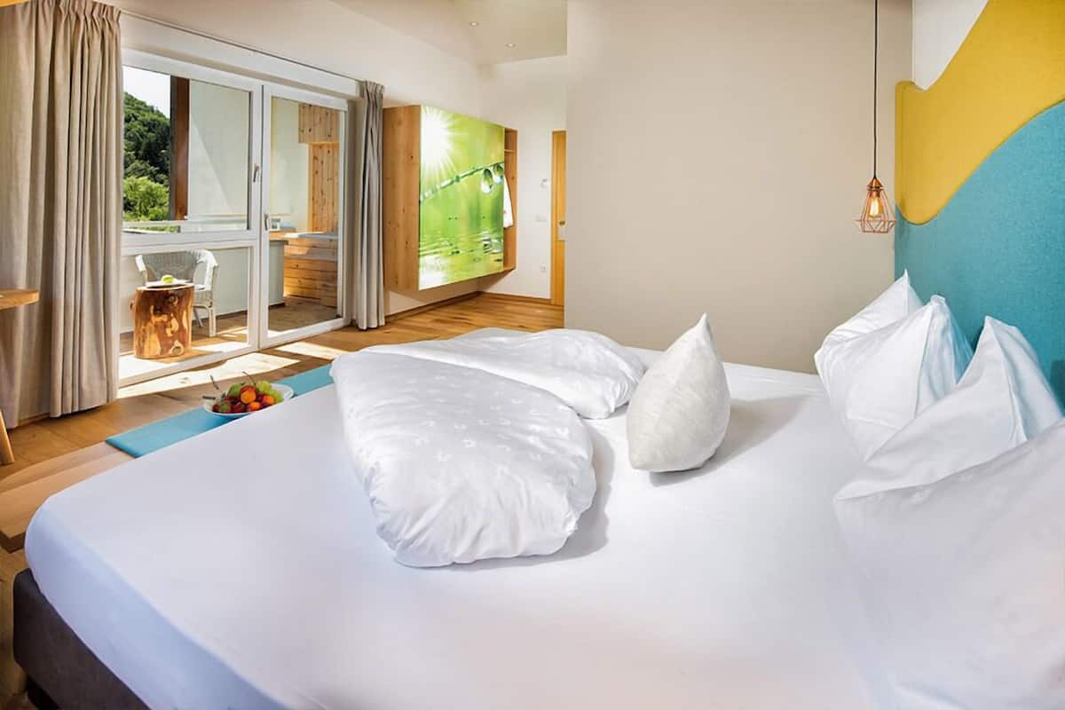 Design studio | Luxe beddengoed, een minibar, een kluis op de kamer