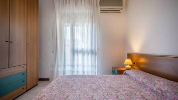 2 habitaciones y ropa de cama