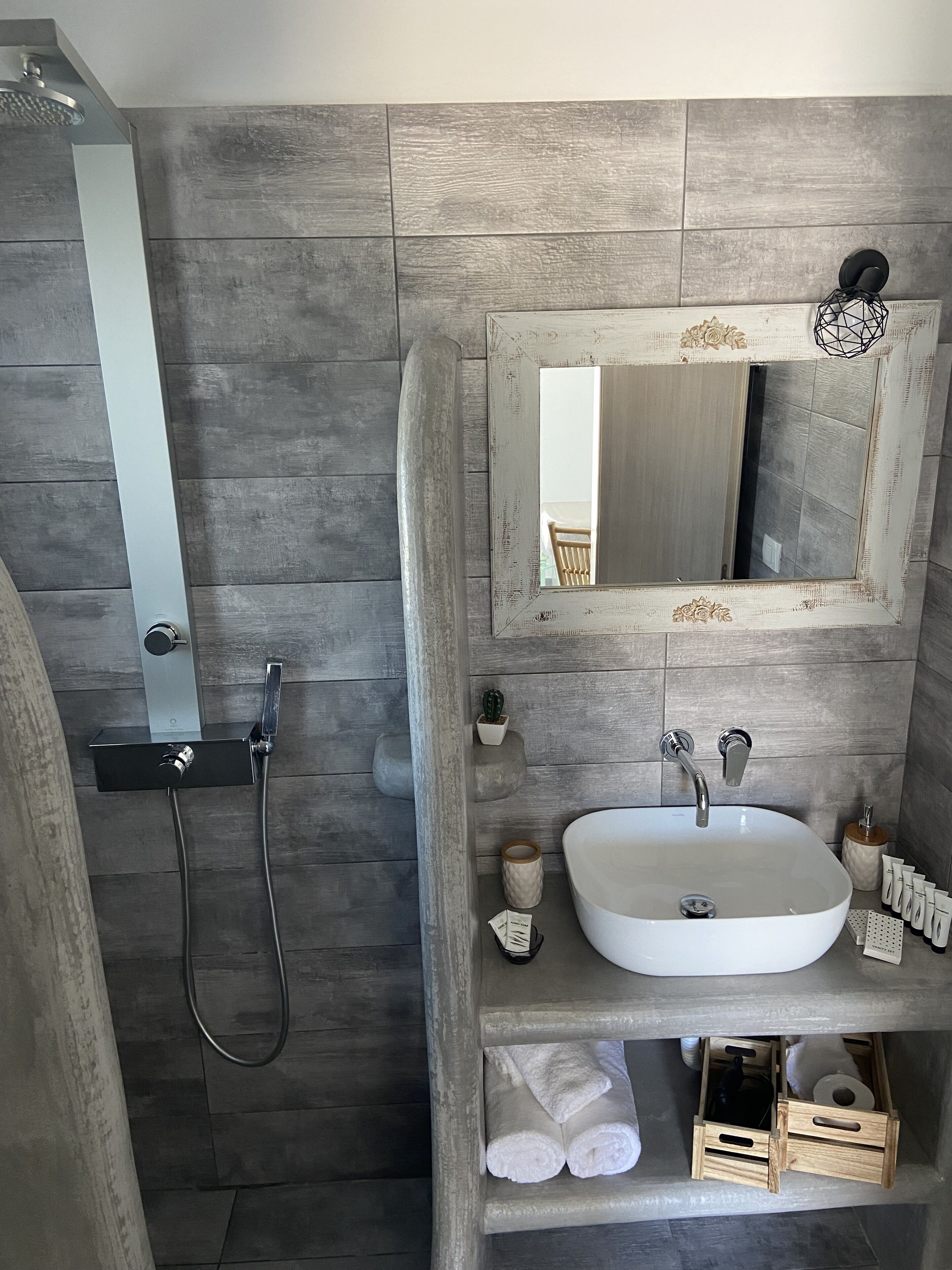 luxury suite, sea view | bathroom | hydromassage showerhead, designer toiletries, hair dryer, dressing gowns