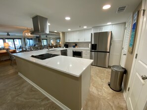 Fridge, microwave, oven, stovetop - Breakers East 102-Gulf Front 2 BR/2 BA/Covered Parking- Beach setup included (Destin)