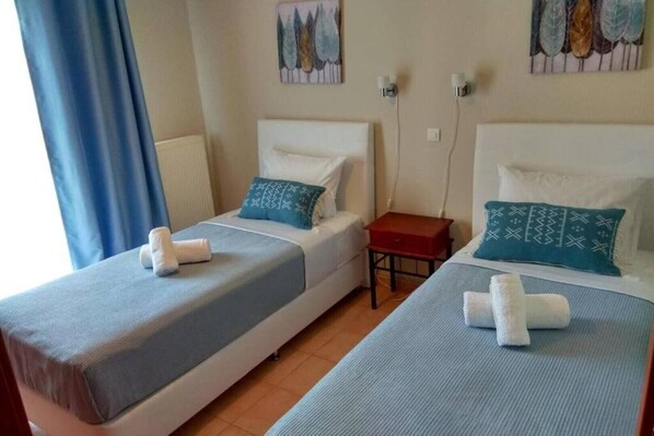 2 chambres, fer et planche à repasser, accès au Wi-Fi (inclus)