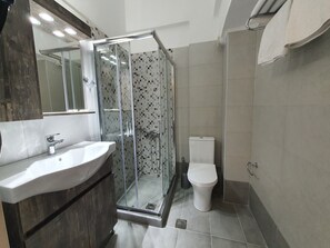Hair dryer, towels, soap, shampoo