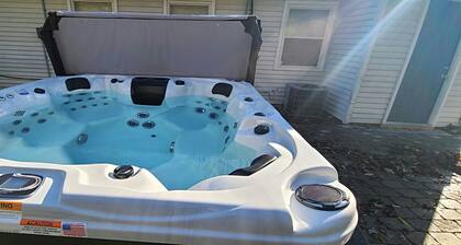 Relax and unwind with deluxe hot tub close to downtown Miamisburg.