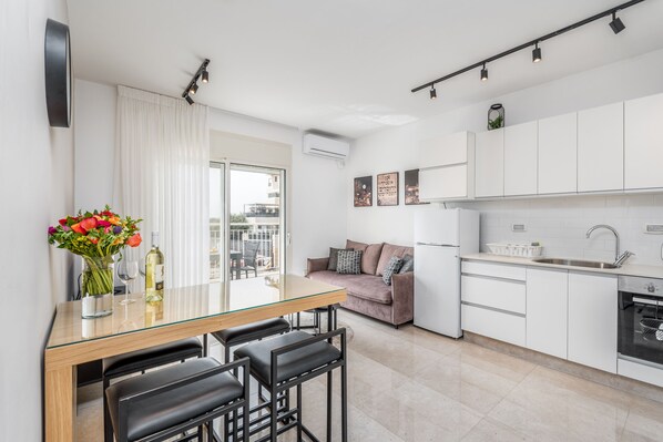 Apartment | Living area | 55-inch Smart TV with cable channels, TV