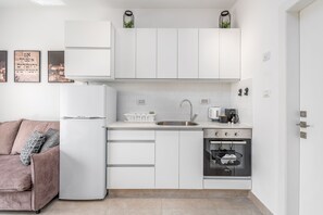 Apartment | Private kitchen | Full-size fridge, microwave, oven, stovetop