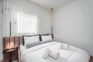 Departamento | 1 habitación, sábanas de algodón egipcio y ropa de cama de alta calidad 