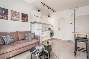 Apartment | Living area | 55-inch Smart TV with cable channels, TV