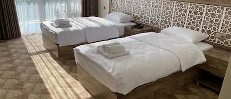 Standard Twin Room | Laptop workspace, travel crib, free WiFi