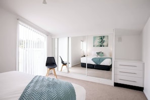 4 bedrooms, desk, iron/ironing board, travel cot