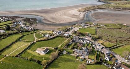Take your foot off the pedal for a moment and bring the family together for a proper beach holiday..