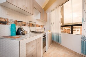 Habitación triple superior | Cocineta privada