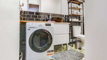 Hair dryer, towels, soap, shampoo
