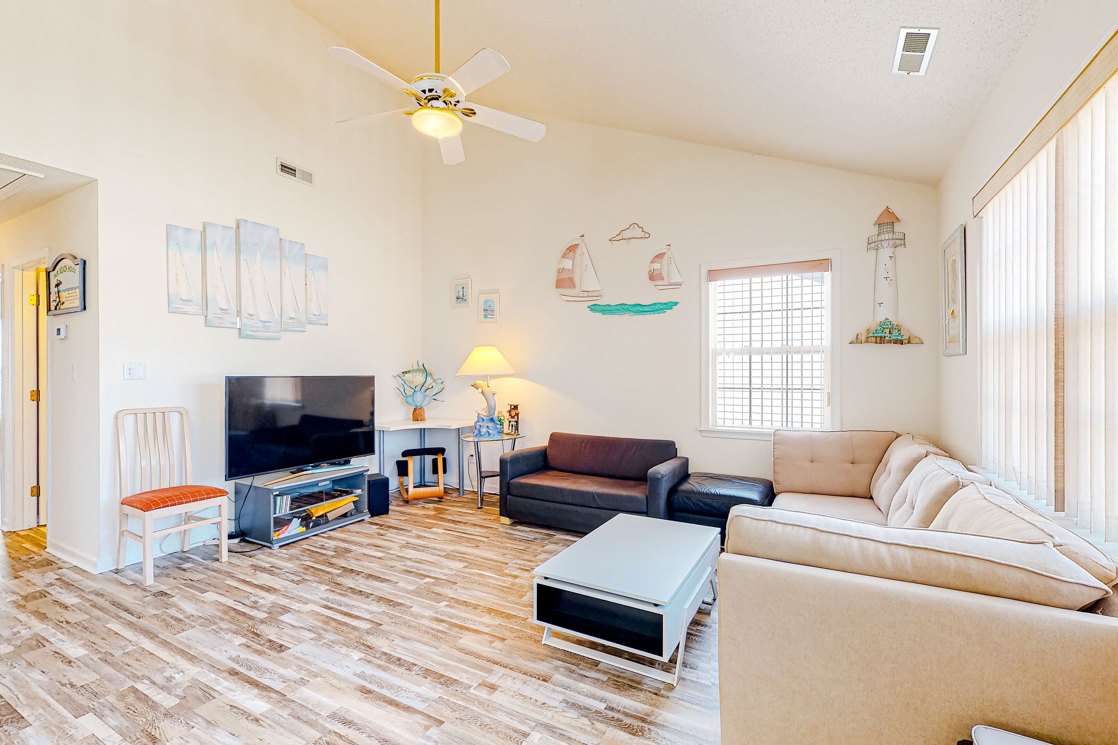 Canal-front condo with water view, balcony & central AC - dog-friendly