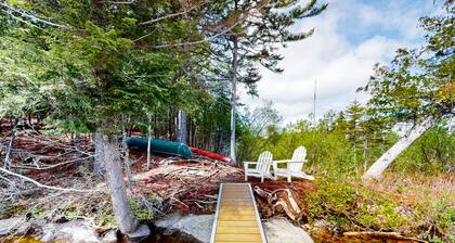 Lakefront home with private dock, canoe & kayak, fast WiFi, and firepit - dog OK