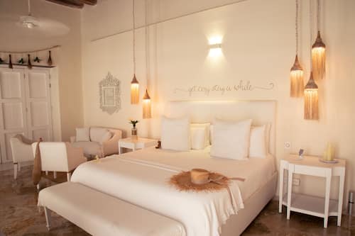 Habitación suite | Premium bedding, down duvets, pillow-top beds, minibar