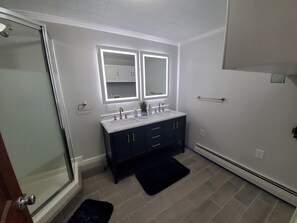 Combined shower/tub, hair dryer, towels, soap