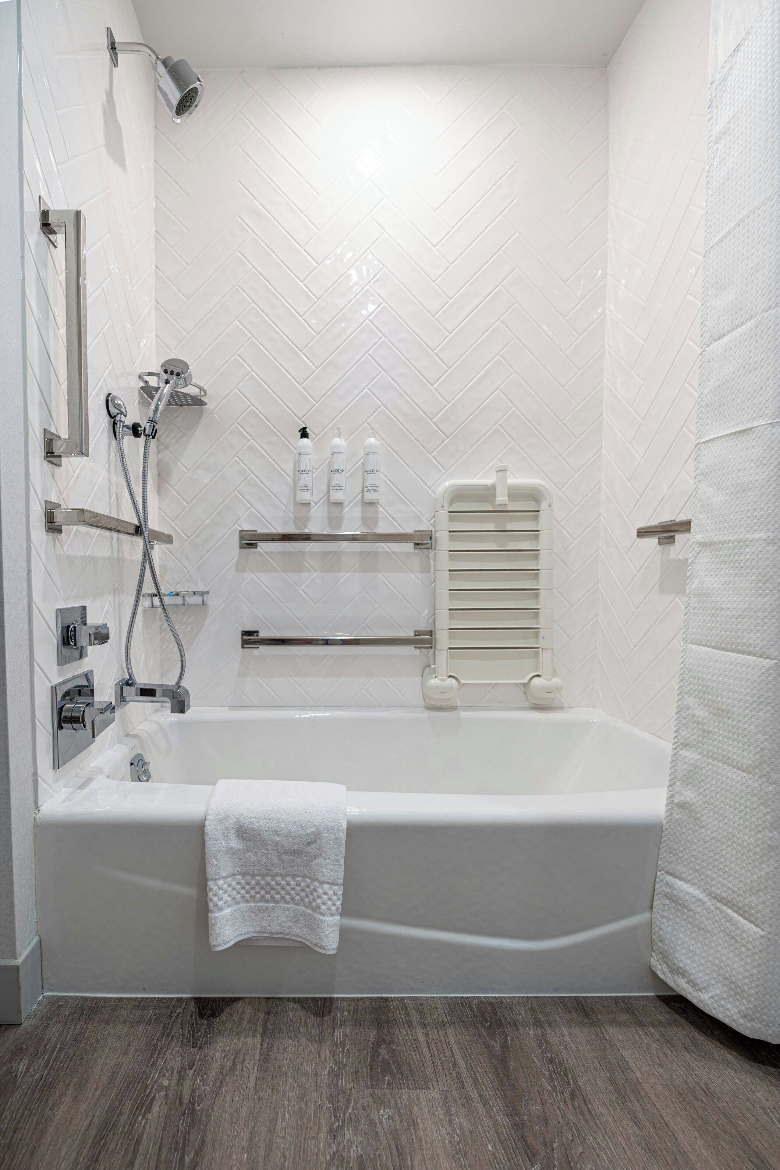 studio, 2 queen beds | bathroom | hair dryer, towels, soap, shampoo