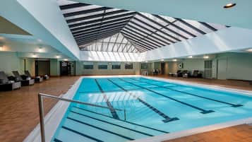 Indoor pool, open 5:00 AM to 11:00 PM, pool loungers
