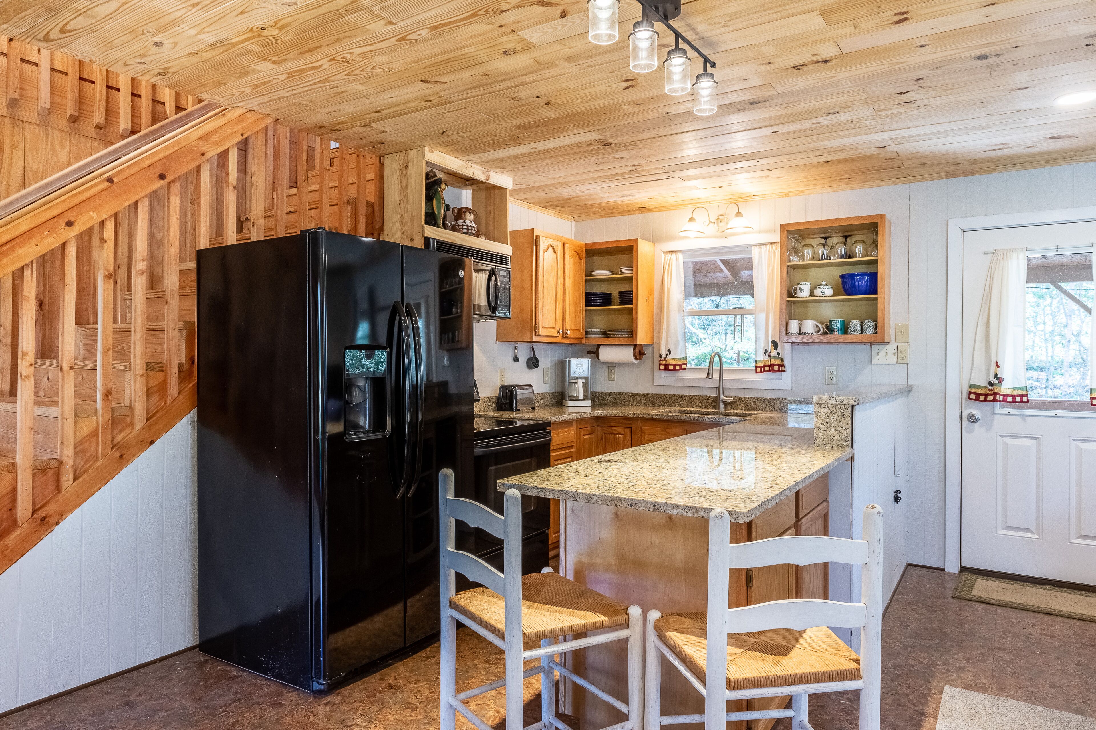 Dog-friendly cabin with WiFi, AC, & upstairs spacious loft - near river and town