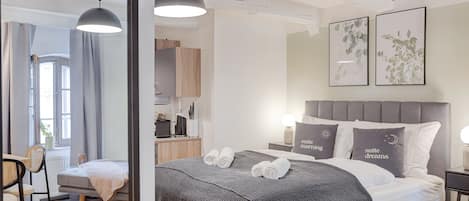 Suite L | Individually decorated, individually furnished, desk, laptop workspace