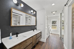 Combined shower/tub, hair dryer, towels, soap